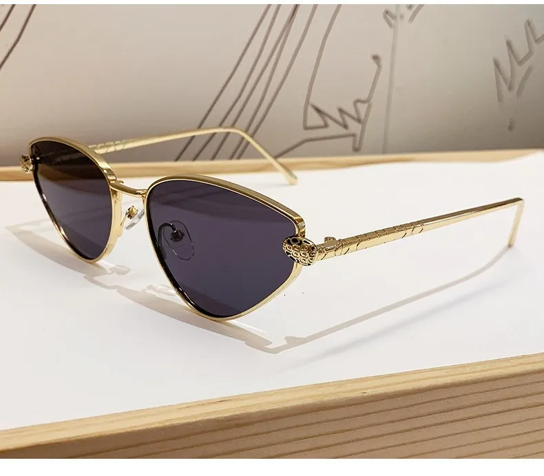 Thin Gold Metal Cat Eye Sunglasses With Carved... From  display picture 3