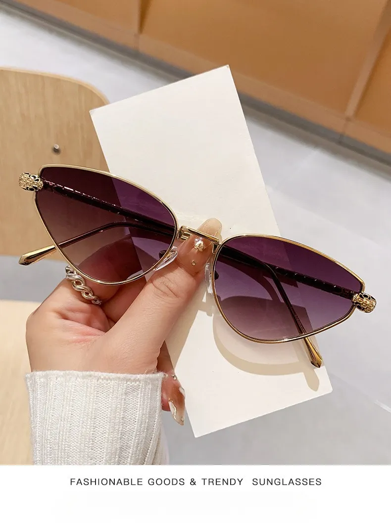 Thin Gold Metal Cat Eye Sunglasses With Carved... From  display picture 1