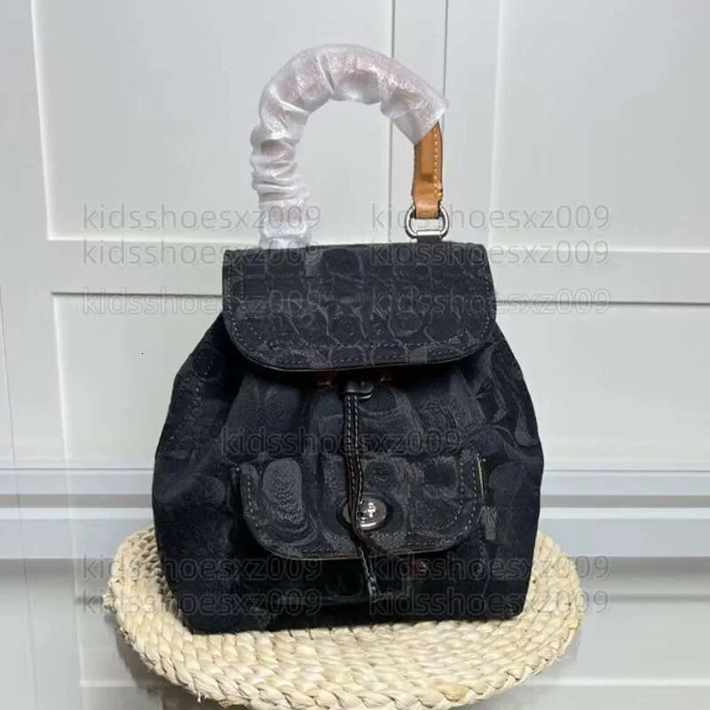 coach backpack for kids Personalized Custom Cheer With Name | Waterproof Lightweight Travel Hiking Causual Bag Back to School Gift Refined pebble leather Inside zip cell phone and multifunction pockets Laptop compartment with zip closure Zip closure recycled polyester lining Top handle with 2 drop Outside zip pockets Adjustable shoulder straps Fits a 12” (zip compartment) or 13” (main compartment) laptop 10 3/4 (L) x 14 (H) x 5 1/4 (W) Style No. Backpack Mini Court With Rainbow