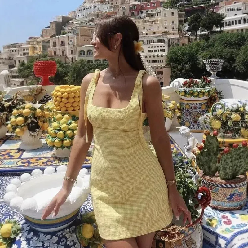 city beach yellow dress Gingham Tie Strap Camisole Mini Beige ... From Choxxxcomb, Rs.2,008.29 In Bulk Color:Black & White Secondary Fabric Content:NOT APPLICABLE Style it with flat Sydney's Closet Women's Sweetheart