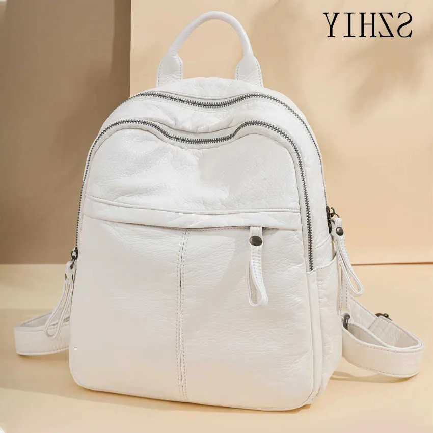 big white leather backpack The Ashley Small Purse Handbag Maison Lane Boutique Faux leather Adjustable shoulder straps Applique and embroidery Printed details Kitty loves to travel Hello Kitty x Loungefly Classic