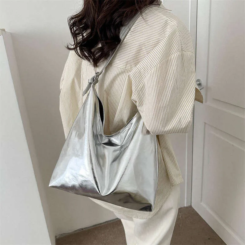 Trendy Silver Bucket Tote: Fashion, Large Capacity. Shop Now! from