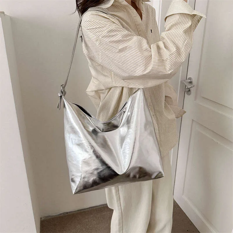 Trendy Silver Bucket Tote: Fashion, Large Capacity. Shop Now