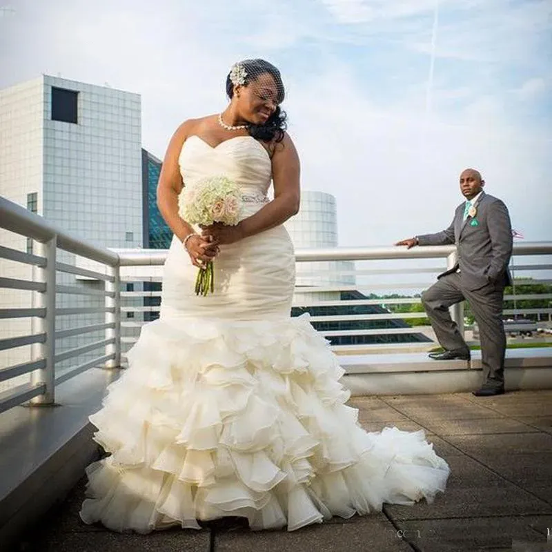 2025 Plus Size Mermaid Wedding Dress with Sweetheart Neckline, Ruffle Skirt, Crystals, and Beaded Sash - Sleeveless Organza Bridal Gown for Black