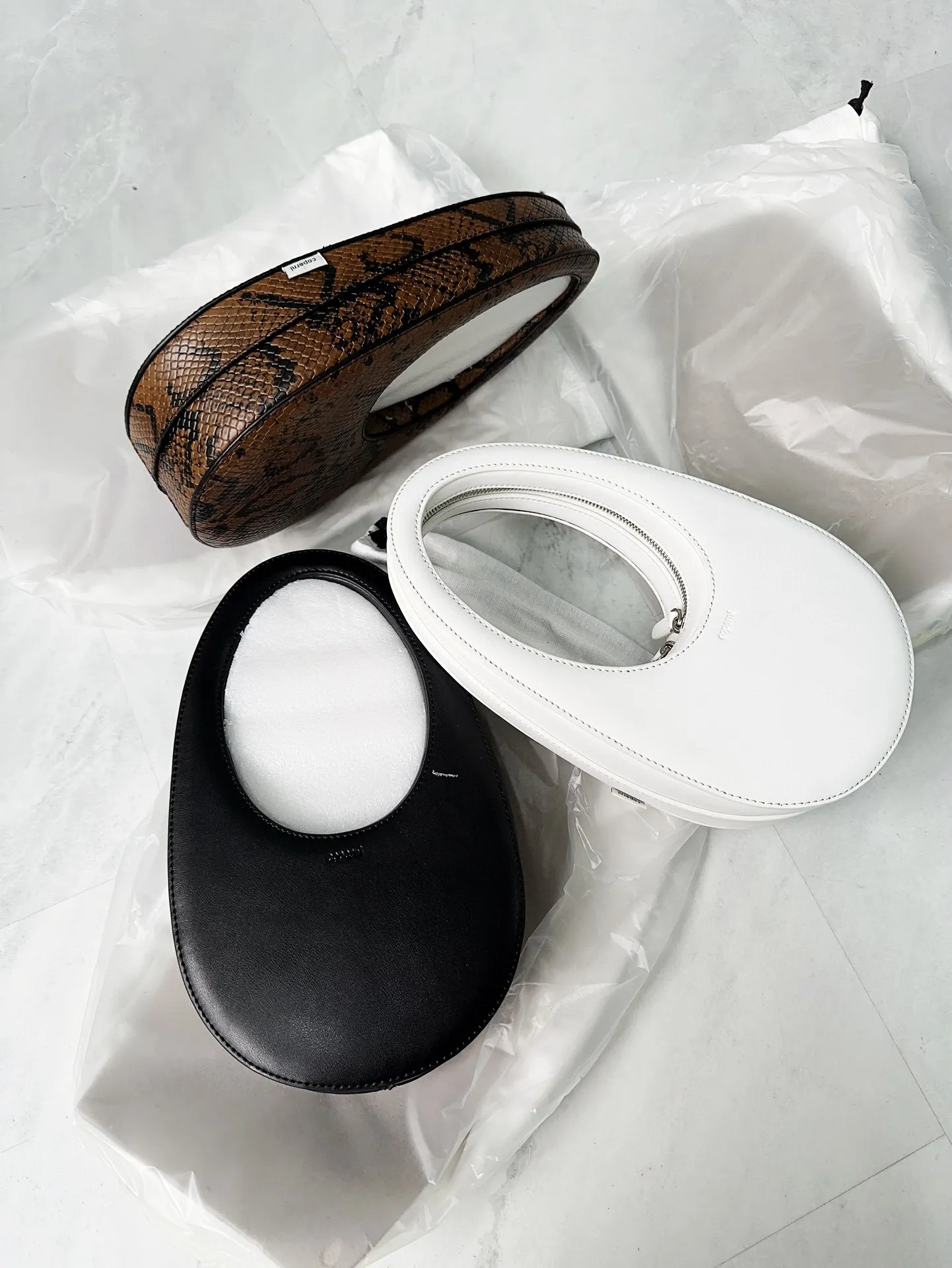 【ATELIER PARK】EGG POUCH + CHAIN DHgate.com:Coperni Inspired Egg Bag: Oval Designer Handbag