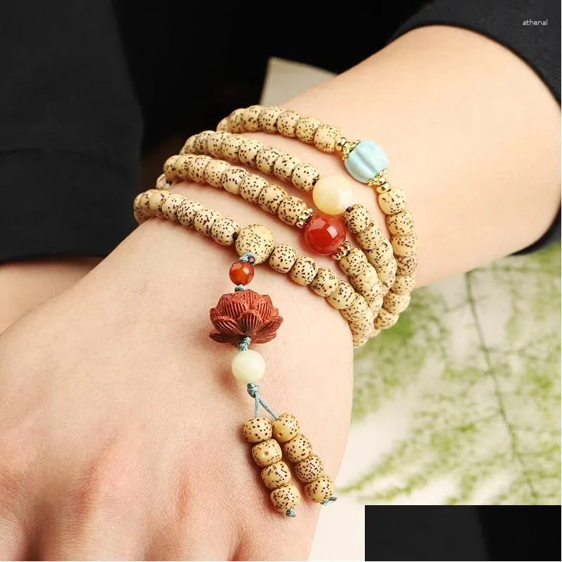 DHgate.com:Hainan Golden Seed Old Xingyue Bodhi 108 Bead DHgate.com:Hainan Golden Seed Old Xingyue Bodhi 108 Bead