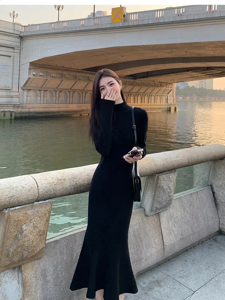 navy blue dress for baby girl The Best Winter Fashion Trends for Petites, According to a Fashion Expert main image 0
