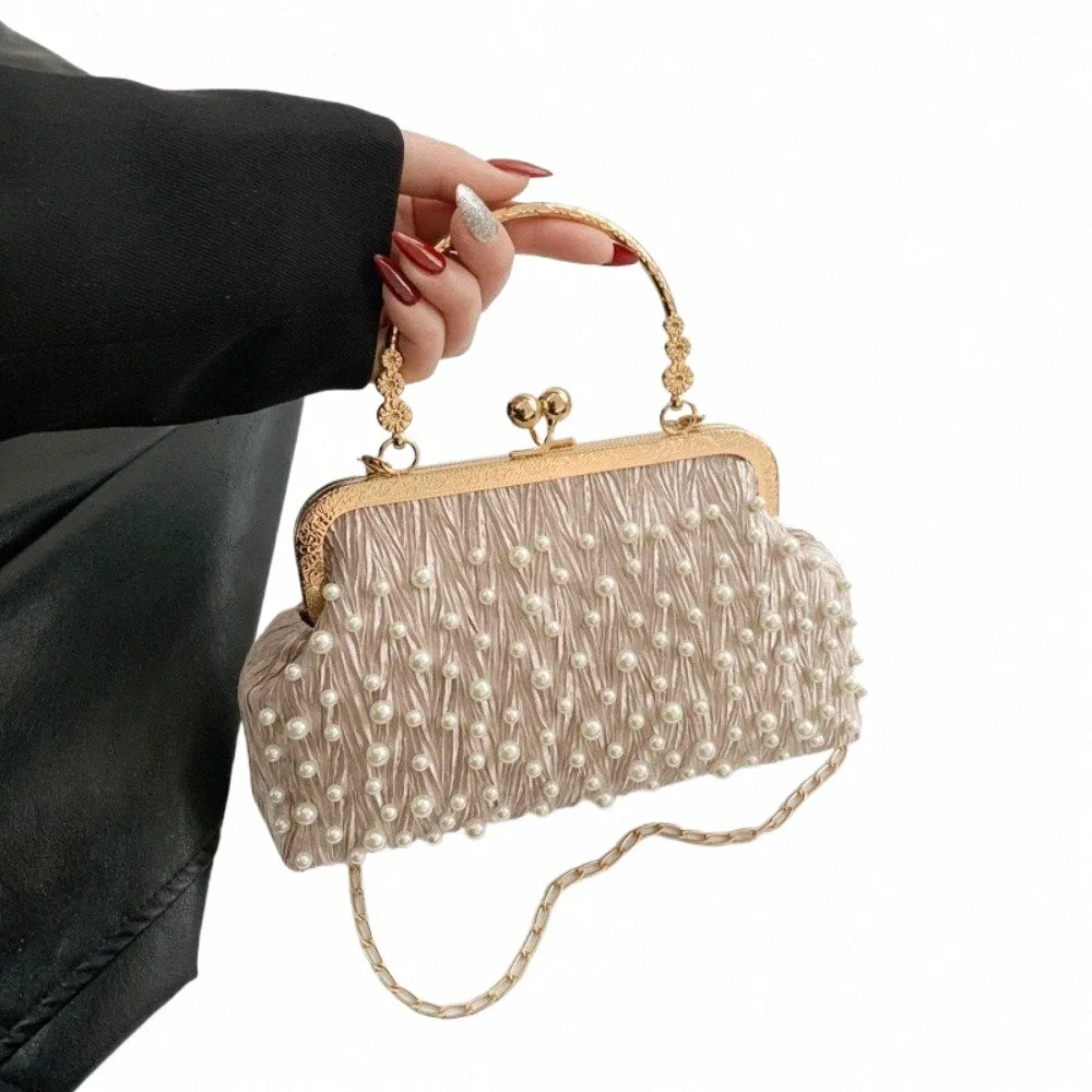 DHgate.com:Elegant Pearl Diamond Inlaid Shoulder Bag - Metal