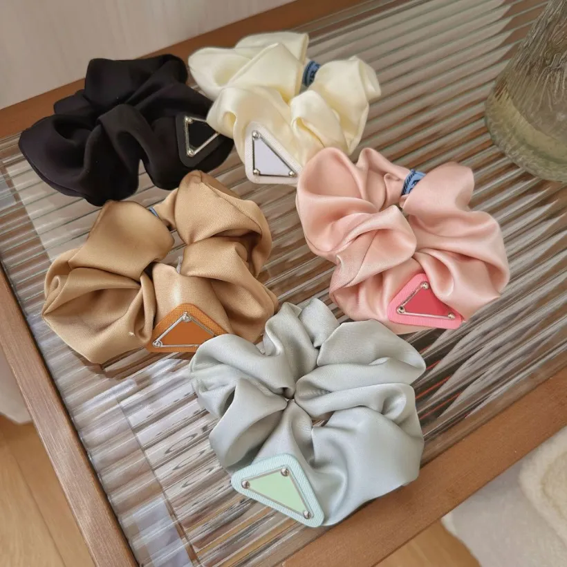 High Quality Triangle Logo Hair Rubber Bands Womens... From  display picture 3