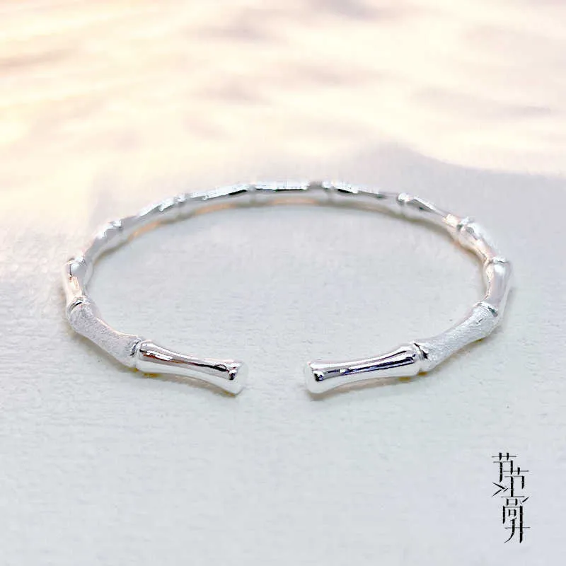 DHgate.com:999 Pure Silver Bamboo Knot Bangle - Womens Open