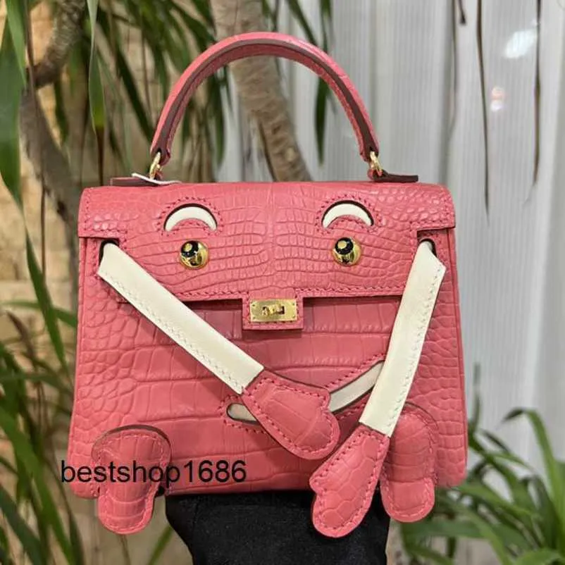 DHgate.com:Handmade Wax Thread Doll Bag with Smiling Face