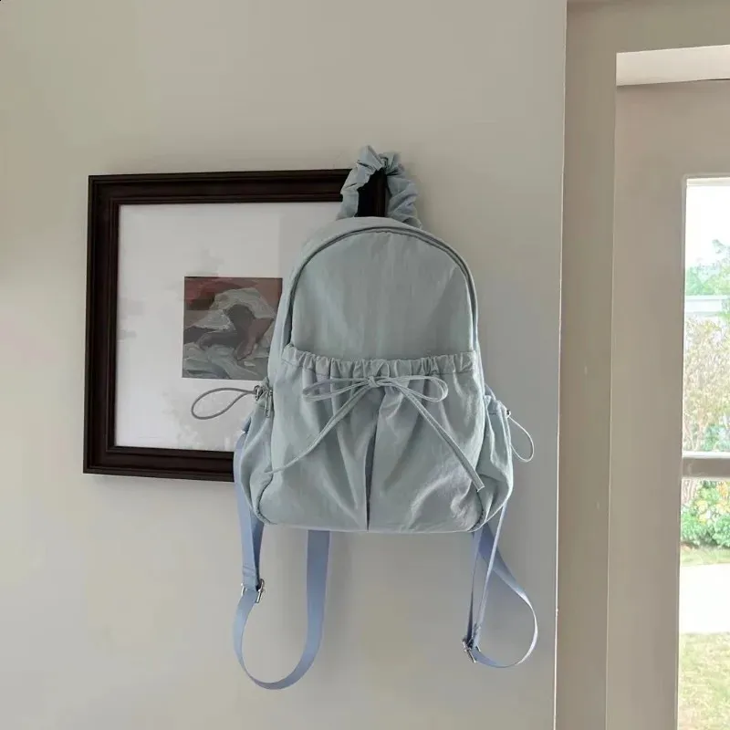 brandy melville light blue mini backpack Loungefly x Disney Eeyore Handbag Floral Open and Clothing Soft to the touch Mebie Baby Mini Plaid Backpack