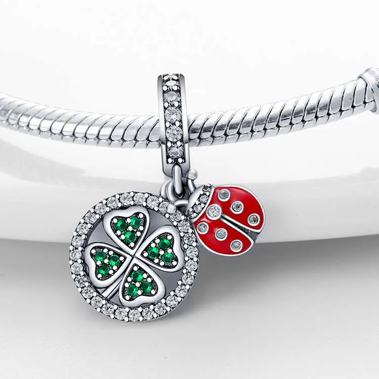 Charm coccinella e quadrifoglio verde in argento per bracciale_voghion.com