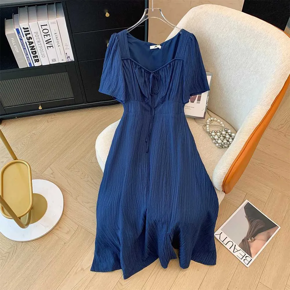 Women's casual silk dress with Pit Strip Fabric, Loose Fit, Slit Hem, Neckline, and Lacing Decoration - Solid Color, Simple and Comfortable.