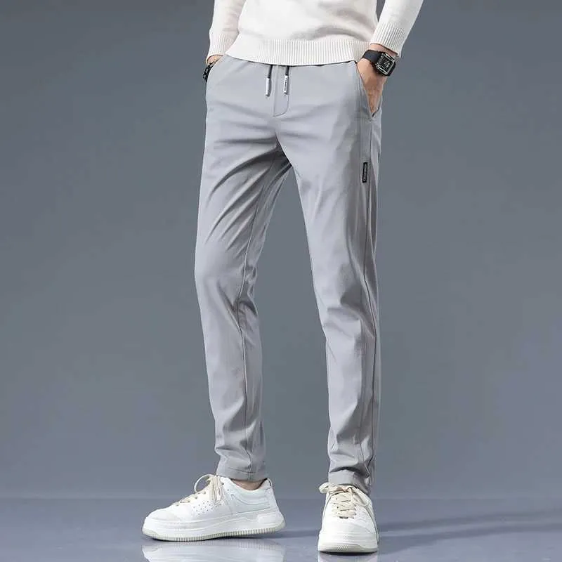 Mens Lightweight Slim Fit Stretch Casual Pants Summer Joggers With Natural Cotton Drawstring Bag And Solid Khaki Design M240924 From Eisirim1 10.78 DHgate.Com
