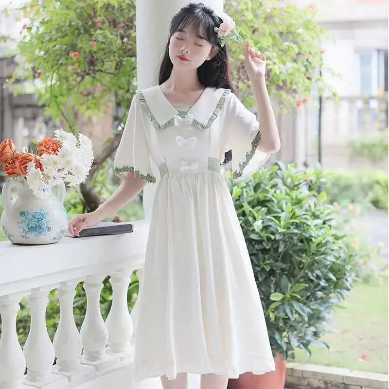 Women's Loose Fit White Dress with Flare Sleeves and Lace Detailing