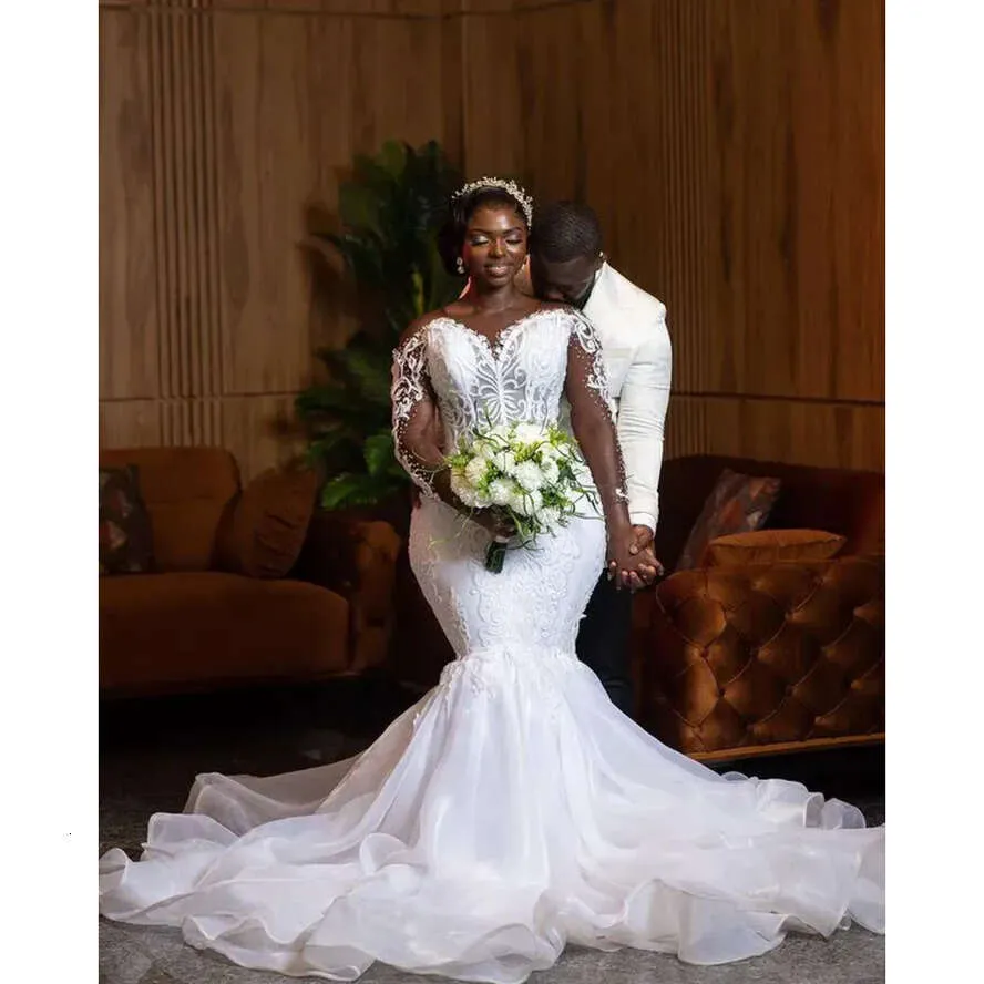 White Mermaid Wedding Dress with Lace & Beads - Sheer Neck, Long Sleeves, Arabic Aso Ebi White Mermaid Wedding Dress with Lace & Beads - Sheer Neck, Long Sleeves, Arabic Aso Ebi