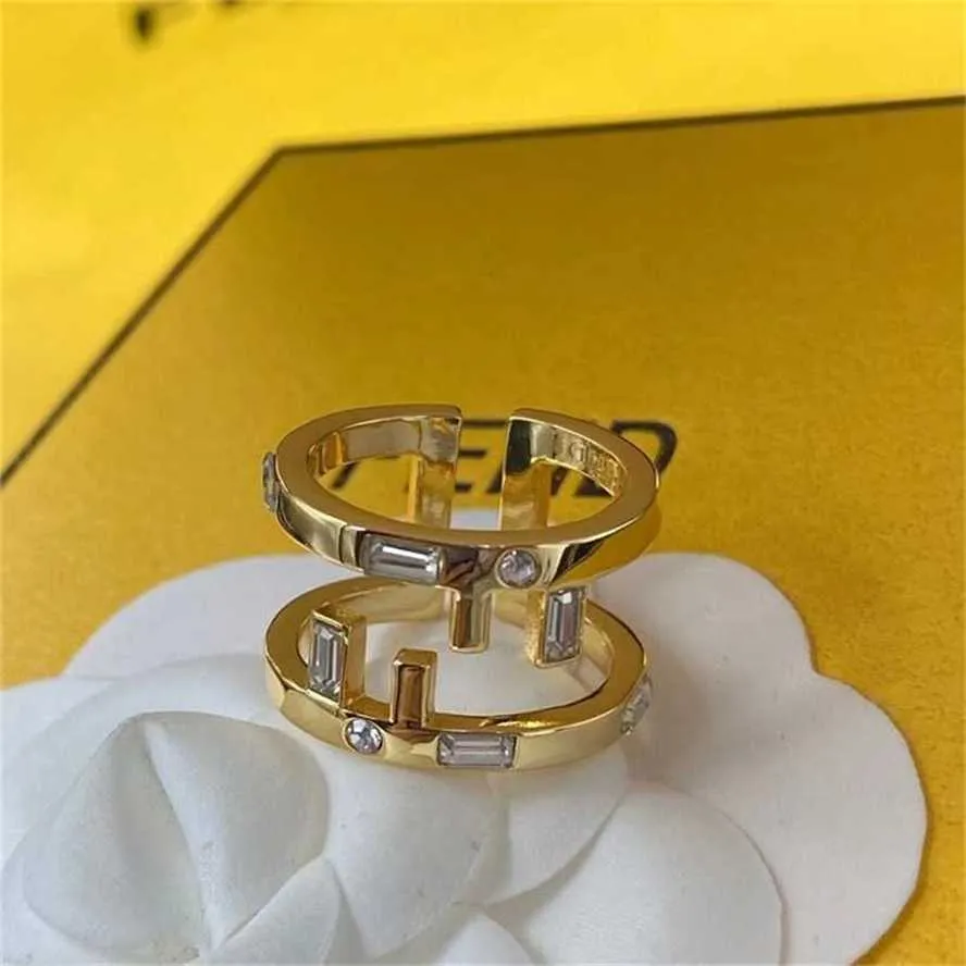 خصم 18 ٪ على Fenjia F New Letter Water Diamond Aplable Open Resear Ring Small Design Ring