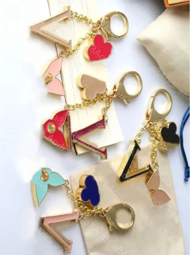 DHgate.com:High-End Leather Keychains for Men and Women, Fashionable ...