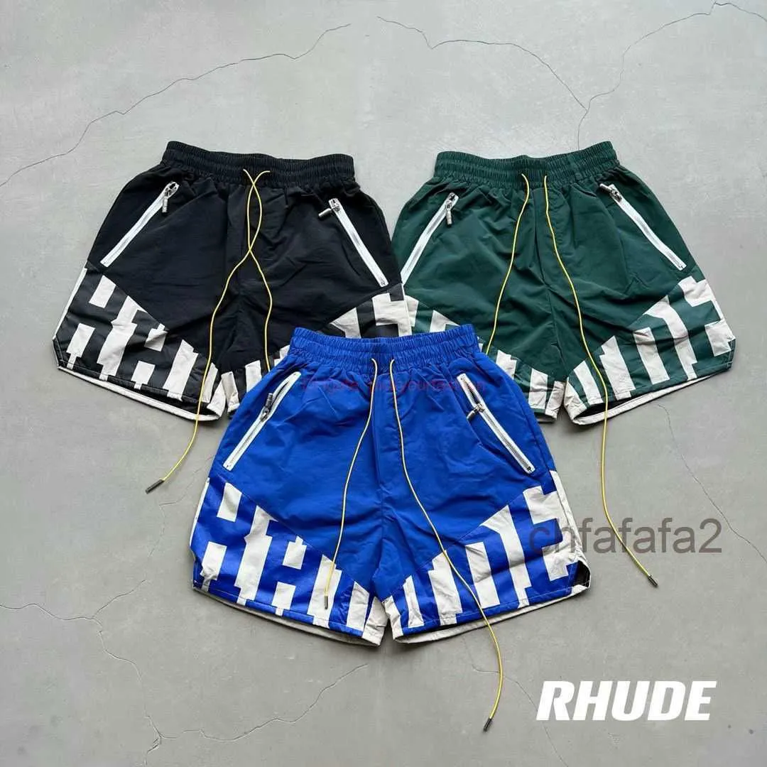 Designer Short Mode Vêtements de loisirs Shorts de plage en conserve Rhude 23fw High Street Heavy Industry Spliced Short tissé Couple Lâche Capris Joggers Sports J0FQ