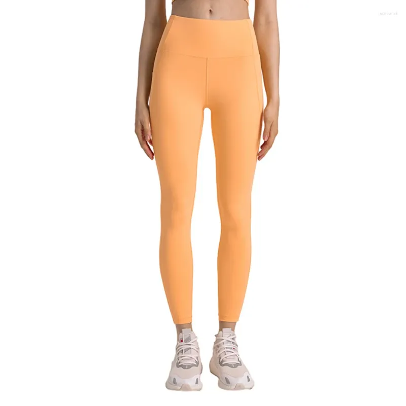 Pantaloni attivi Naked Feeling Vita alta Push Up Controllo della pancia Slim Yoga con tasche laterali Super elastico aderente Corsa Sport Fitness