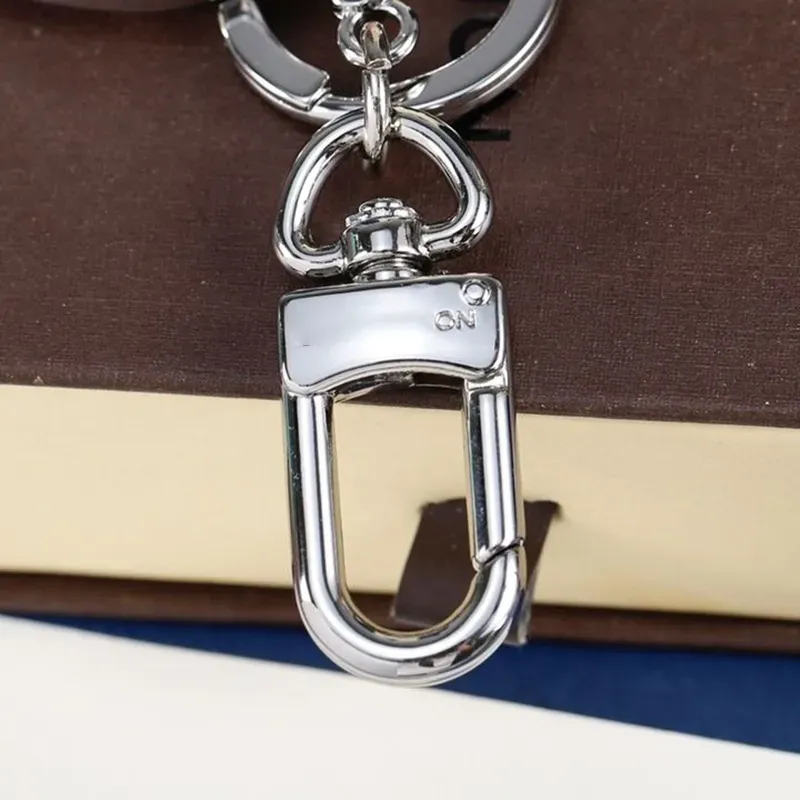 Metalowe brelokowe brelok do klęski kluczy dyni dla mężczyzn marka Pierścień Para V Kluczowa skórzana łańcuch kluczy ręcznie robiony z oryginalnymi pudełkami Louiseliies Vittonlies