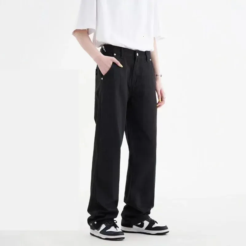 Herrstreetkläderbyxor Knapp dekorera jeans mode trend lösa raka byxor svarta färg casual byxor s-2xl 240102