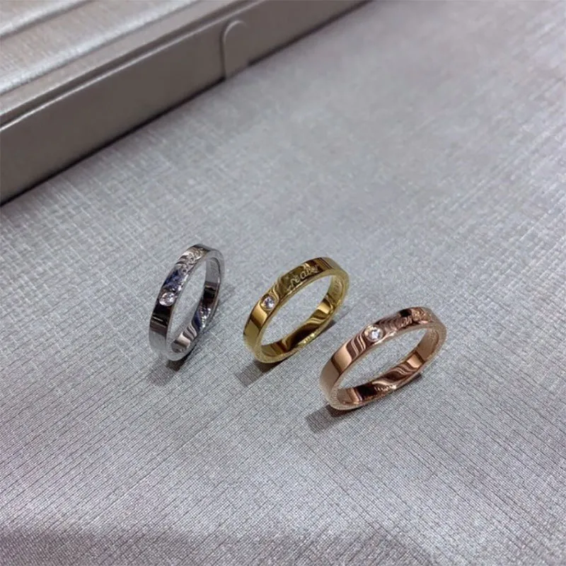 кольцо кольца для женщин фирменная версия один бриллиант с логотипом пара кольцо из титановой стали узкая версия широкая версия серия Love пара колец с покрытием из 18-каратного золота