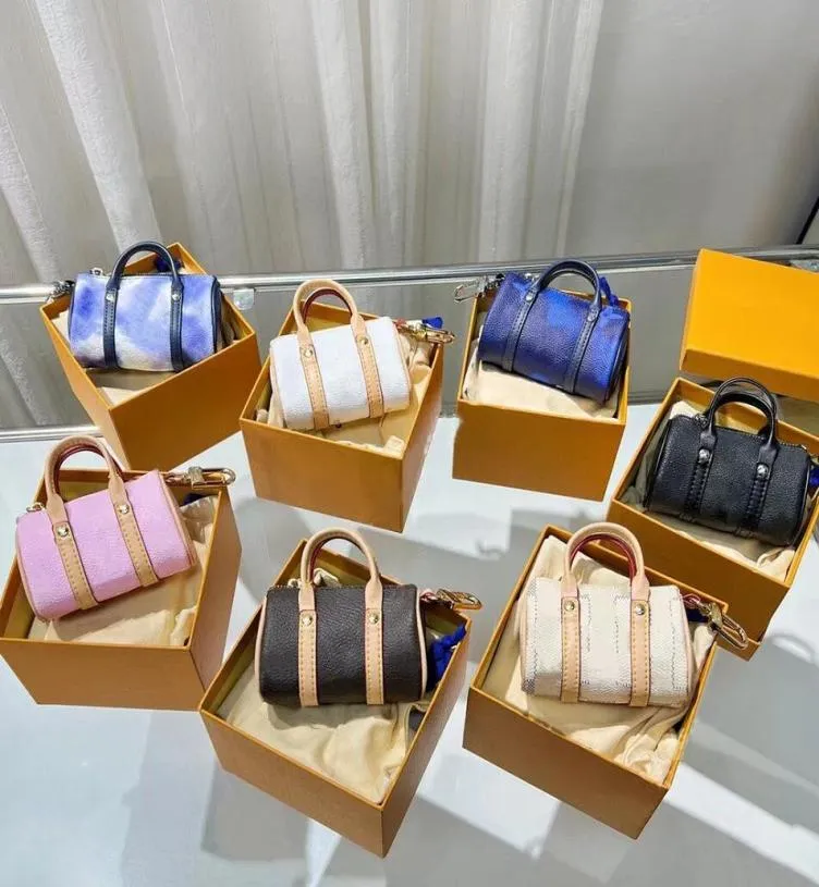 Klassiker som trycker på kvinnor Keychains Luxury Leather Change Purse Designer Mini Shell Bag Pendant Accessories Couples ryggsäcksmynt PU8045882