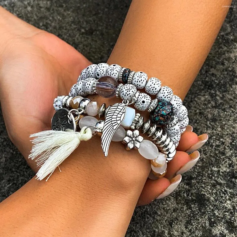 Strand Charm Multi Layered Bangle Set för kvinnor 4st exotiska runda glaspärlor armband bohemiska kvinnliga mode smycken tillbehör