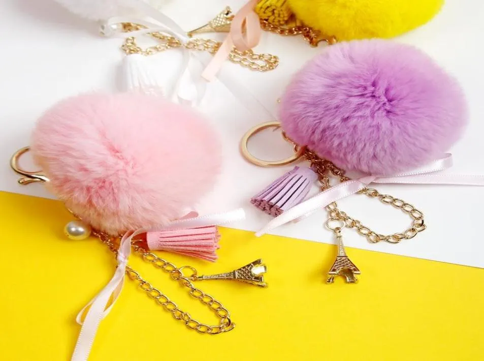 Keychains 2021 Lovely Eiffel Tower Natural Fur Pompom Furry Ball Keychain for Women Key Chains Bag Imititated Pearl Pendent D5211049808