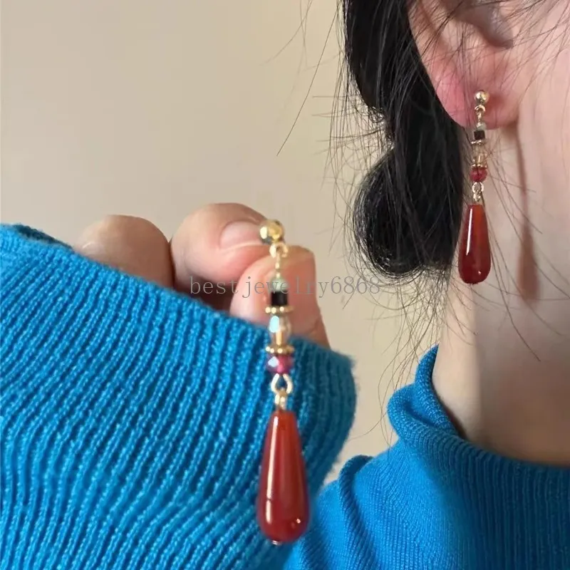 Boucles d'oreilles Vintage ethniques de couleur rouge en forme de goutte d'eau pour femmes et filles, boucles d'oreilles géométriques longues à pampilles en résine de Style chinois