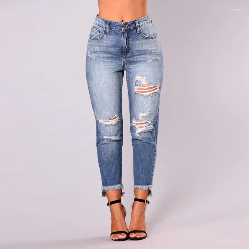 Jeans da donna per pantaloni in denim sottile a vita alta elasticizzati con nappa con foro estivo femminile