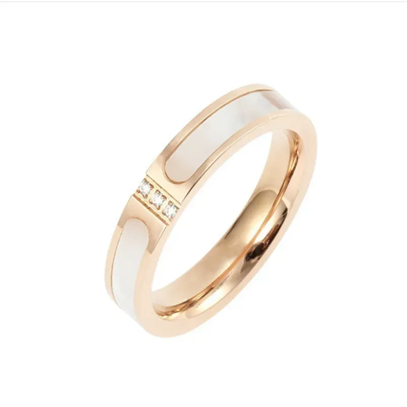 Designer-Ringe Hersteller liefern direkte koreanische Version der Muschel mit eingelegtem Hao-Stein und drei Diamanten. Mutterschale, 18 Karat Roségold, Titanstahl, Farbring für Frauen