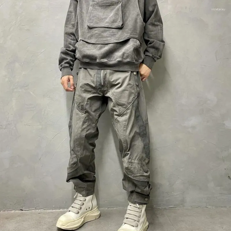Fatos masculinos estilo vanguardista desgaste design lavado e desgastado multi-bolso retalhos calças de carga resíduos solo retro moda na moda casual