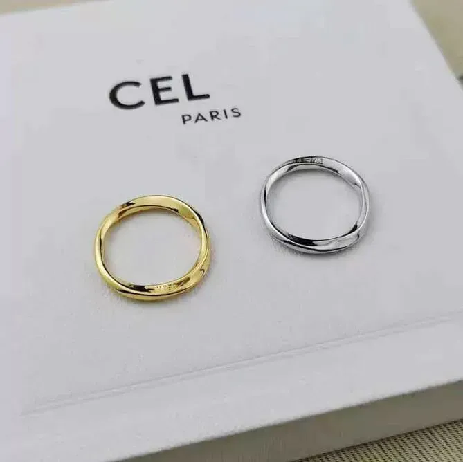 Nouveau anneau de créateur Anneaux pains pains minces minimalistes design à la mode à la mode Bague Twist Bague Anello Anello Rague de mariage avec boîte