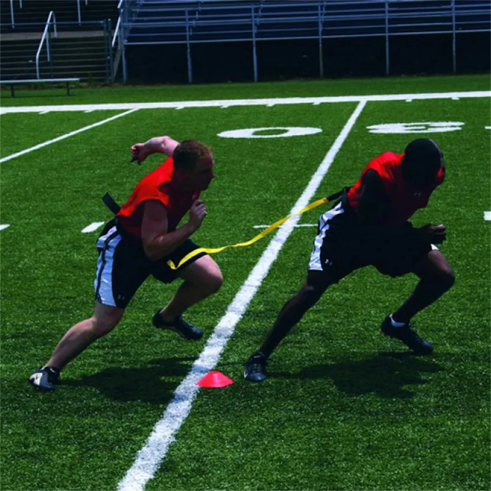 football players resistance band stadium