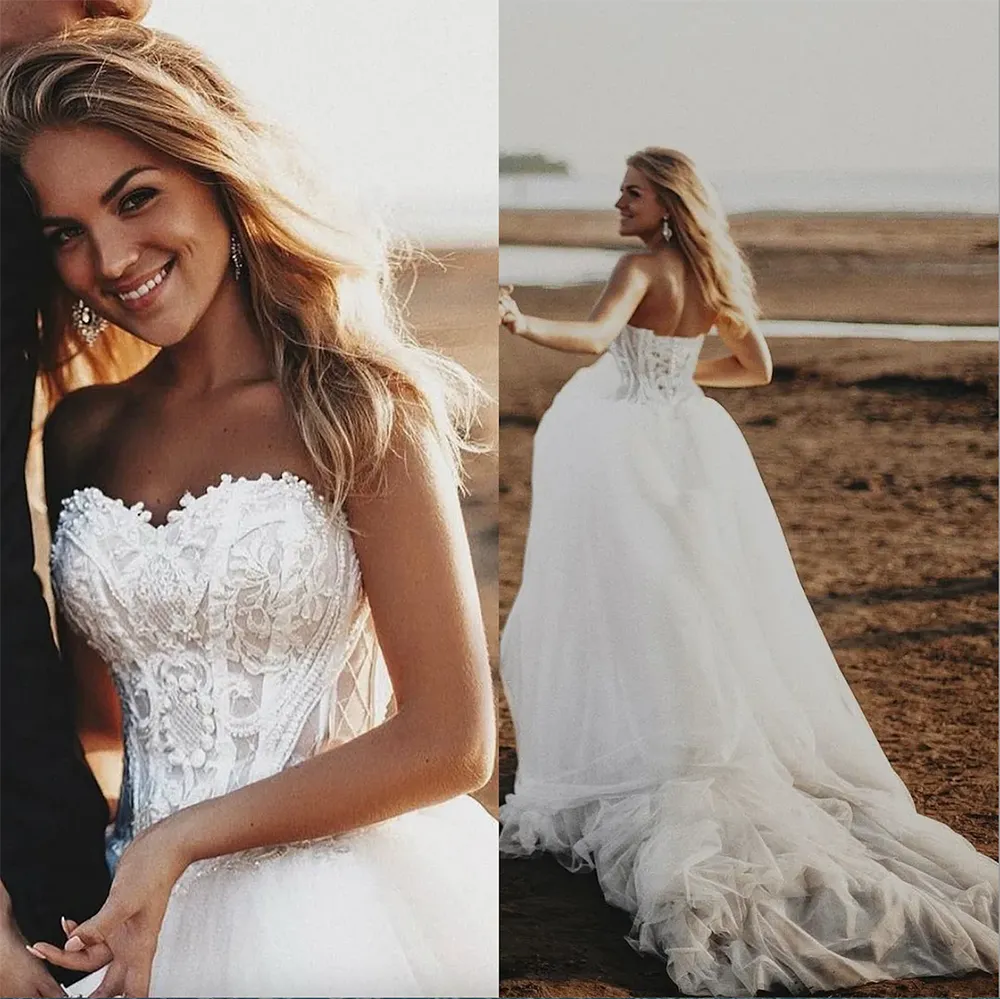 2024 Country Bohemian Wedding Dresses Sexig Sweetheart Lace Applicques Boho Bridal Glänningar Sexig backless Sweep Train A Line Wedding Dress