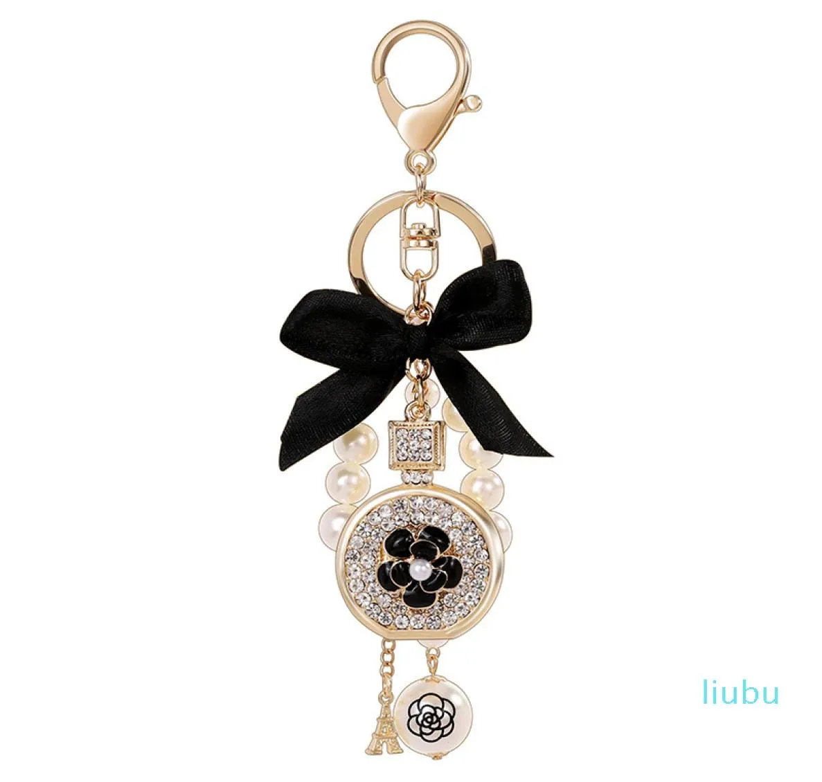 Lovely cute bow pearl flower perfume bottle keychains new fashion ins luxury designer diamond rhinestone bag charm5446618