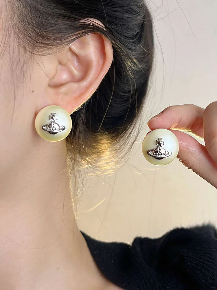 Viviennely Westwoodly The design feels like buttons pearls Saturn earrings high-end planet earrings