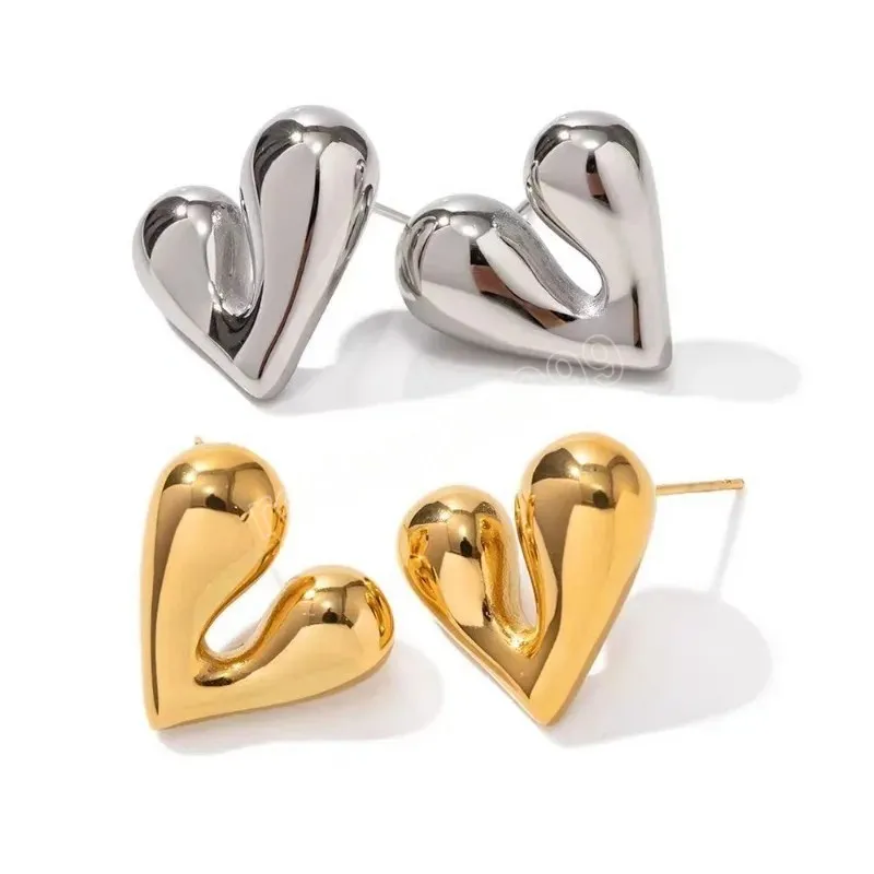 Gioielli moderni Orecchini a bottone a forma di cuore in metallo dal design europeo e americano le donne Nuovi accessori le orecchie di tendenza