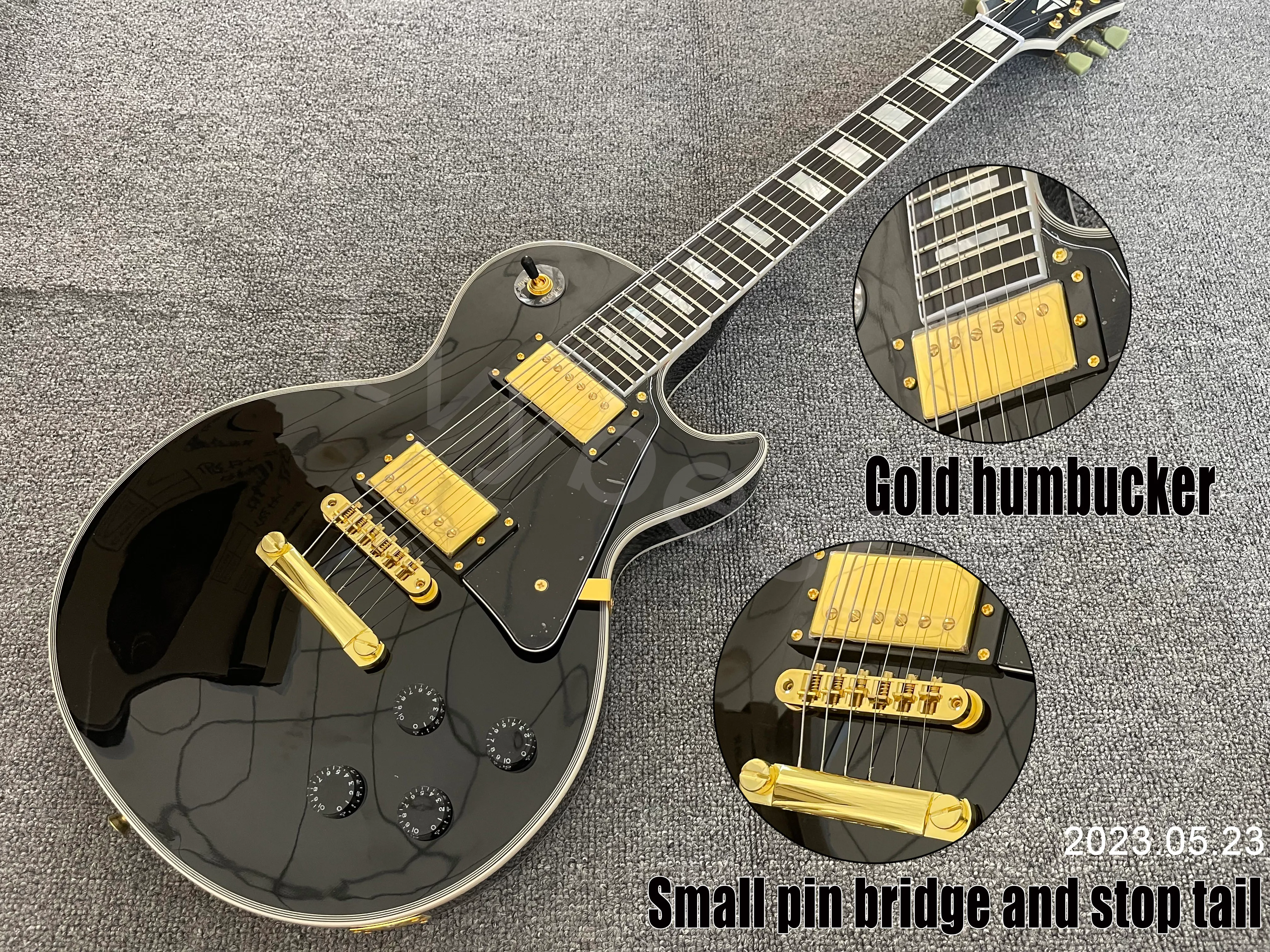 E-Gitarre Ebenholz-Griffbrett, solide schwarze Farbe, goldene Teile, HH-Tonabnehmer mit schwarzem Schlagbrett, kleiner Stiftbrücke und Knochenmutter