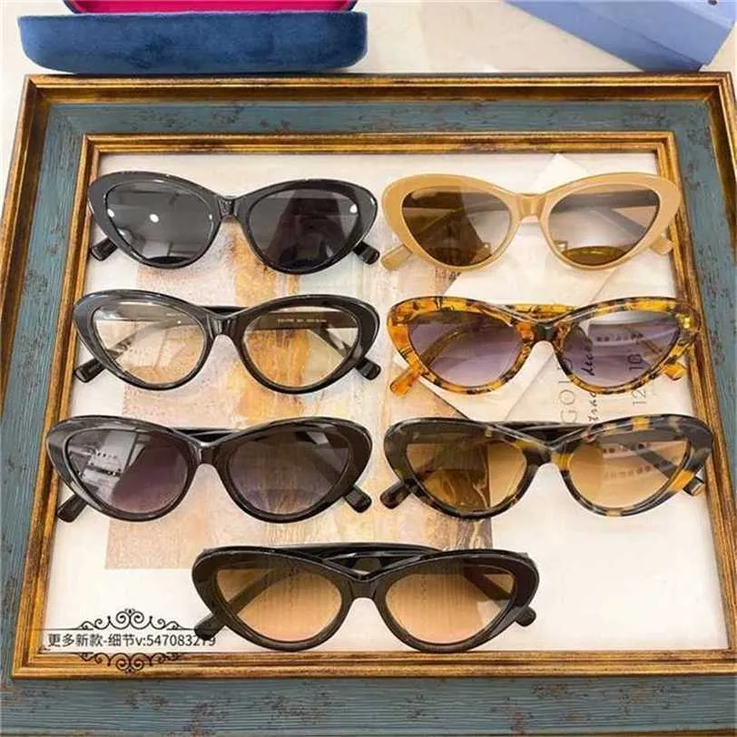 % 12 indirim güneş gözlüğü yeni yüksek kaliteli aile kadın moda ins aynı kişiselleştirilmiş kedi göz plaka güneş gözlüğü erkek GG0117