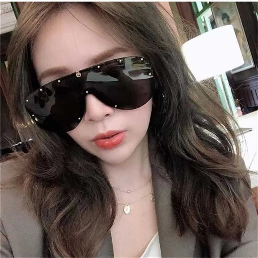22% KORTING Zonnebrillen Nieuwe hoogwaardige familie's nieuwe modieuze gepersonaliseerde oogbescherming met klinknagels Zhou Yangqing's dezelfde zonnebril GG0667S