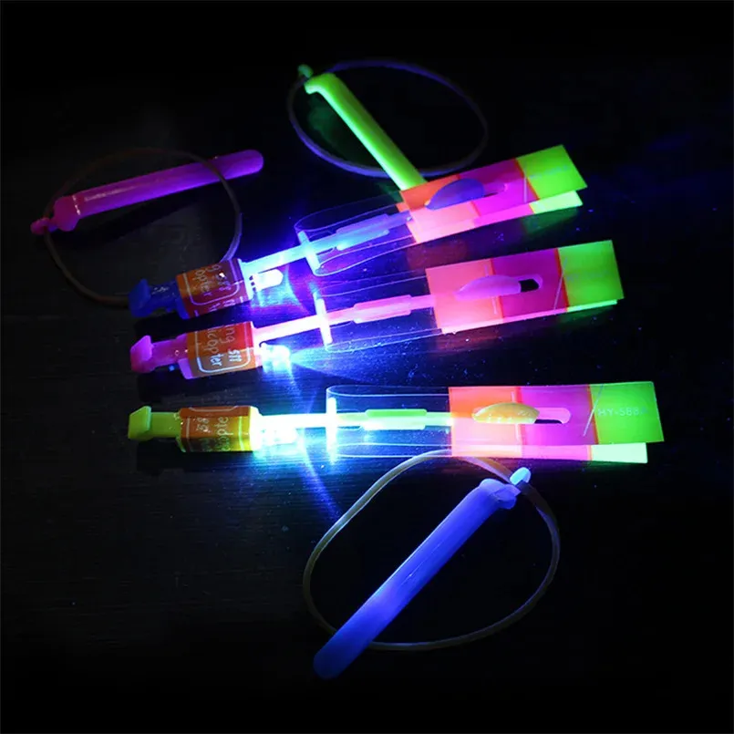 50pcs Amazing Light Toy Rocket Helicopter Flying Toy LED Light Toys Party Fun Gift Rubber Band Catapult 240105