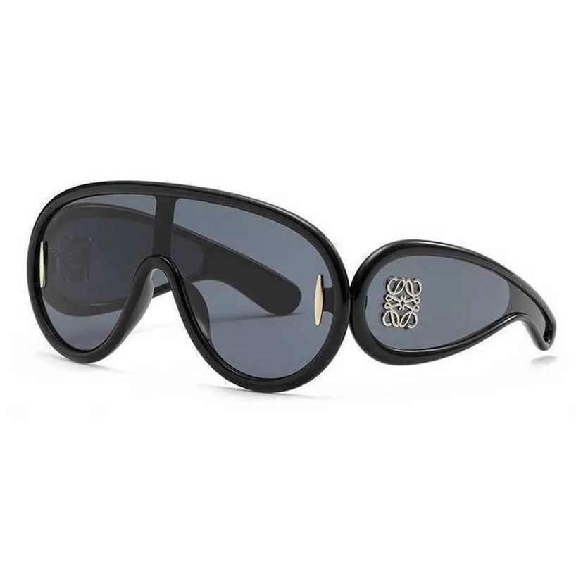 58% Оптовая продажа солнцезащитных очков 23014 New Wing Style Цельные модные женские персонализированные солнцезащитные очки Advanced Sense для путешествий