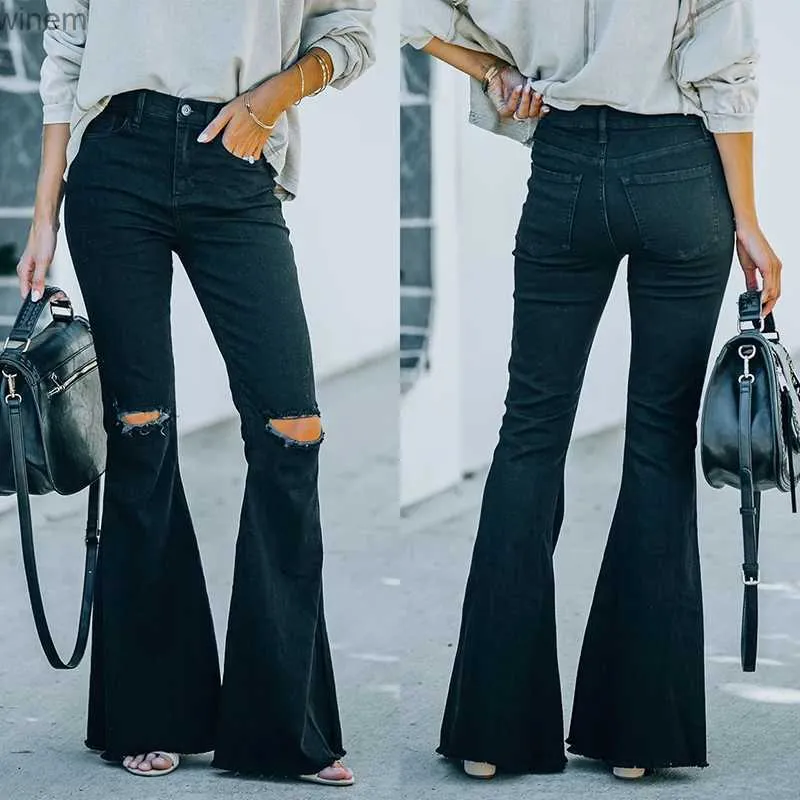 Jeans da donna neri strappati svasati moda donna vita alta skinny bootcut signore sexy buco del ginocchio denim invecchiato pantaloni a campanal240105