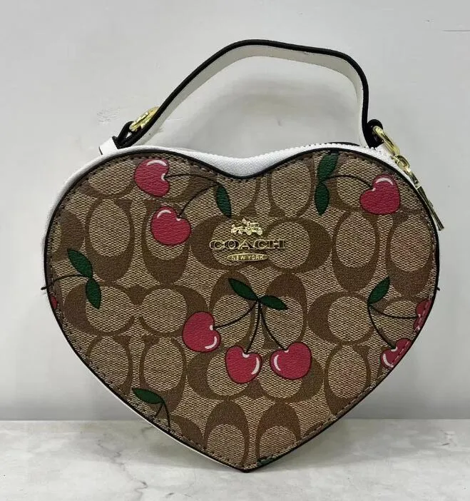 DHgate.com:Peach Heart Shape Designer Handbags for Women