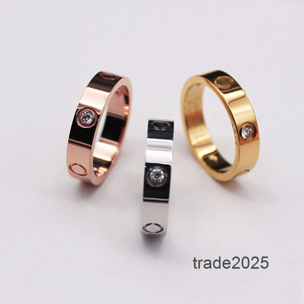 Bague de créateur 2021 Haute poli Design classique Femmes Amant Anneaux 3 Couleurs En Acier Inoxydable Couple Anneaux Design De Mode Femmes Bijoux En Gros