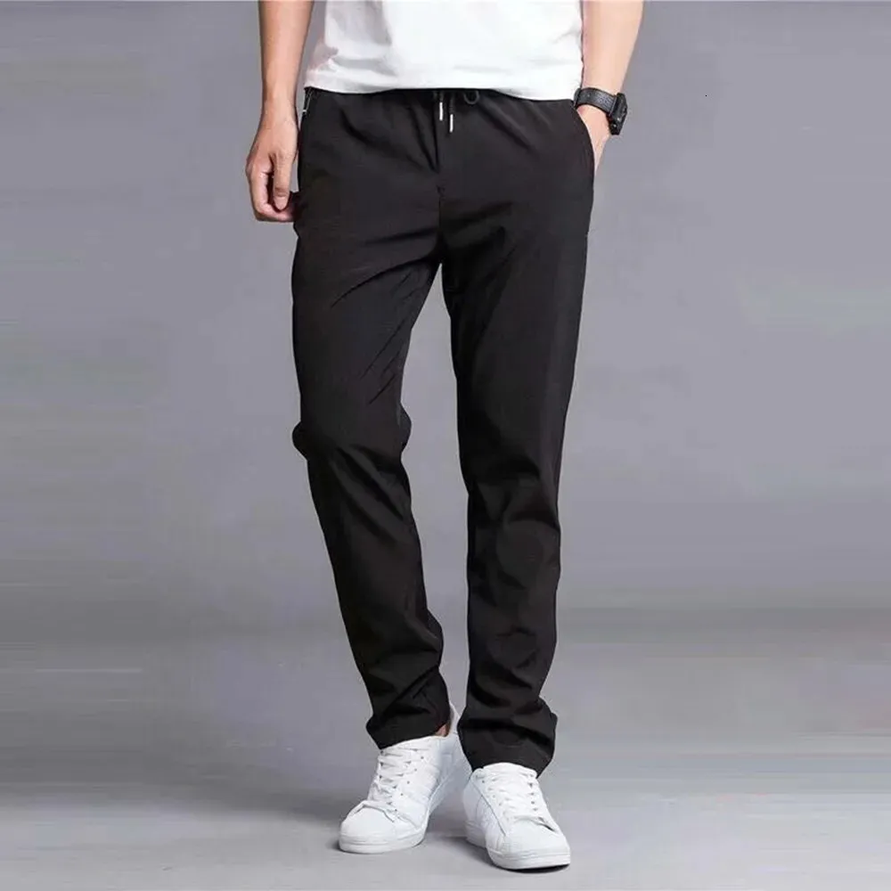 Mens Winter Warm Thermal Trousers Casual Straight Athletic Fleece fodrade tjocka byxor Lossa Sports Jogges Gym Sweatpants 240108